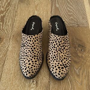 QUPID spotted leopard slip on mules. Size 6.
